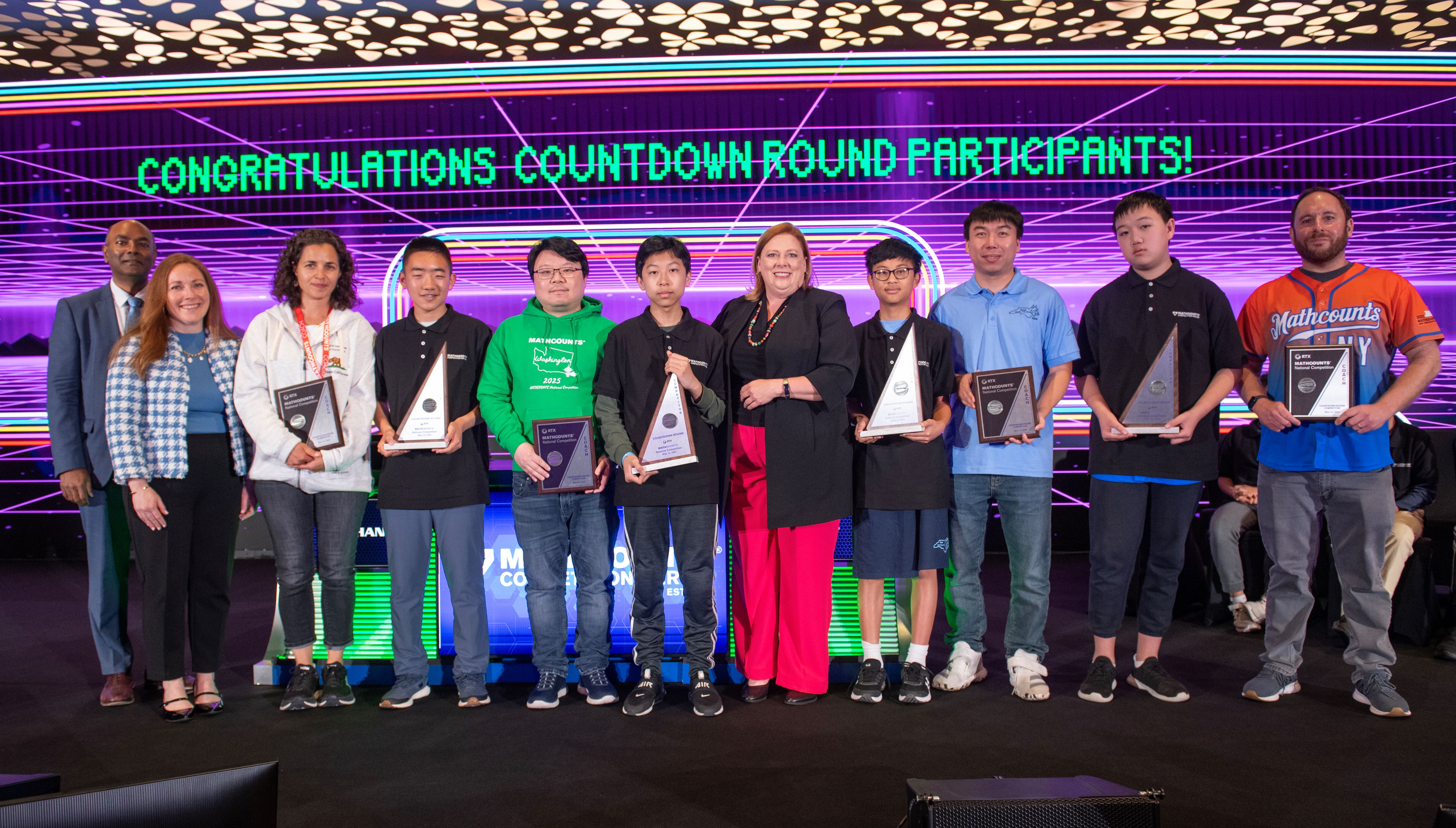 Photo of 2025 CDR participants holding trophies