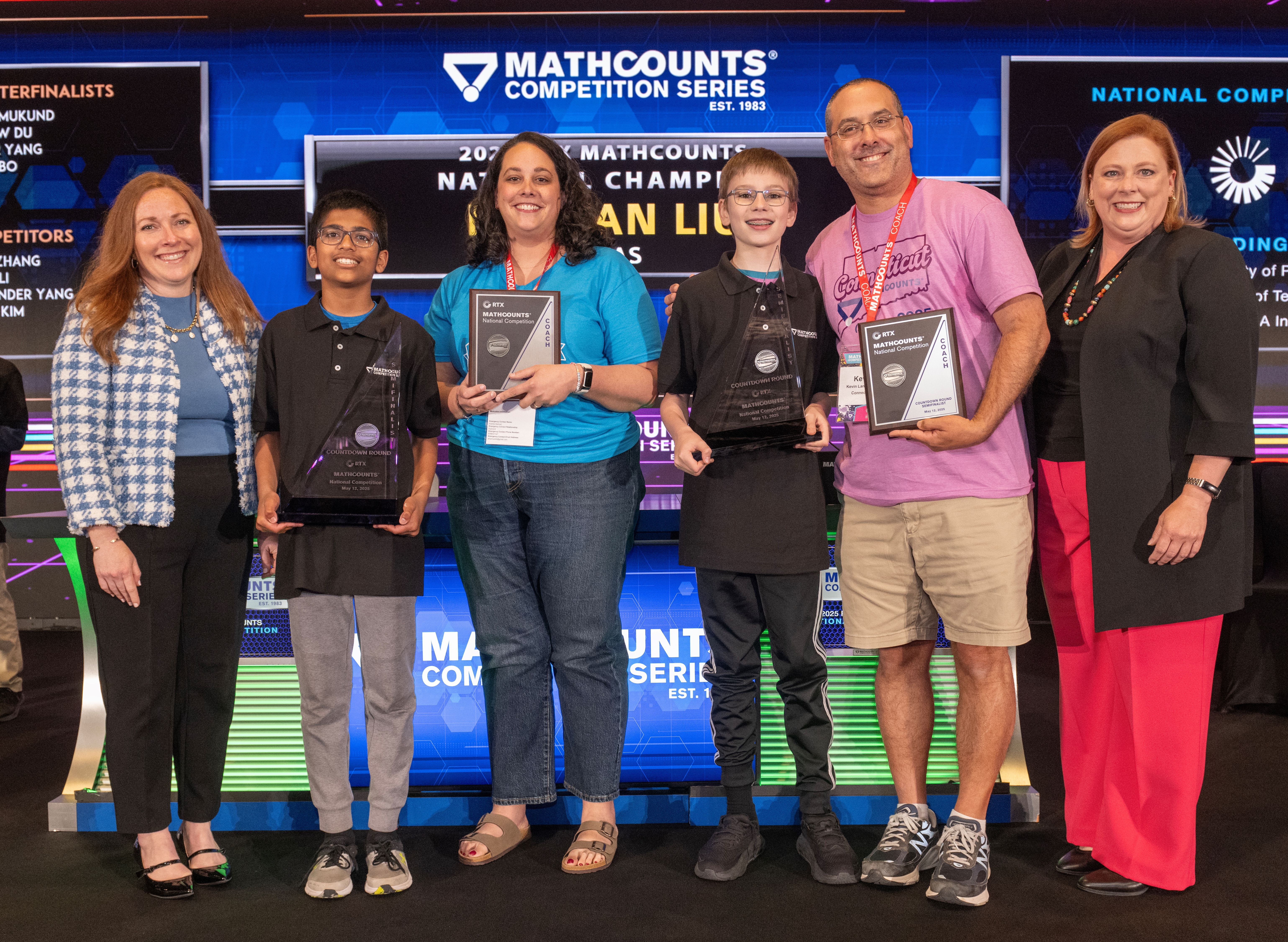 Photo of 2025 semifinalists Advait Joshi and Alexander Svoronos holding trophies